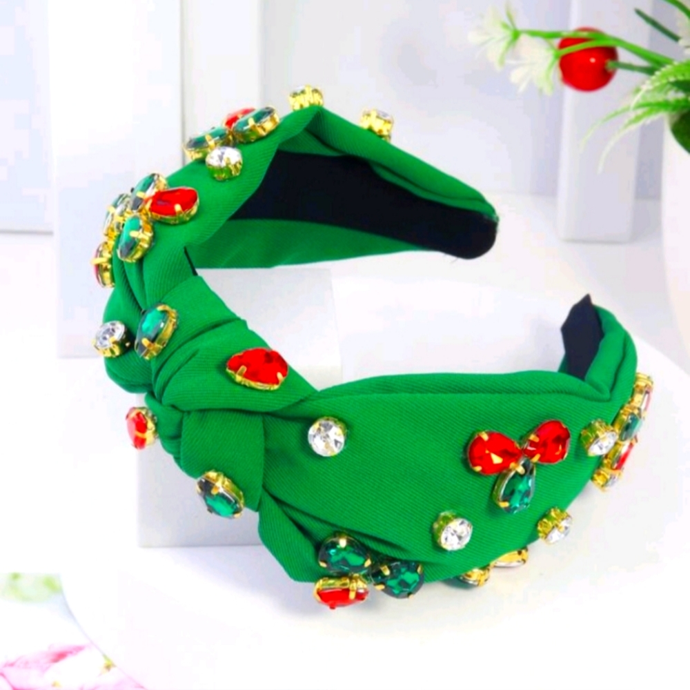 Green headband with knot design with stones
